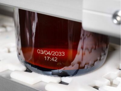 laser coding on glass bottle by Markem-Imaje